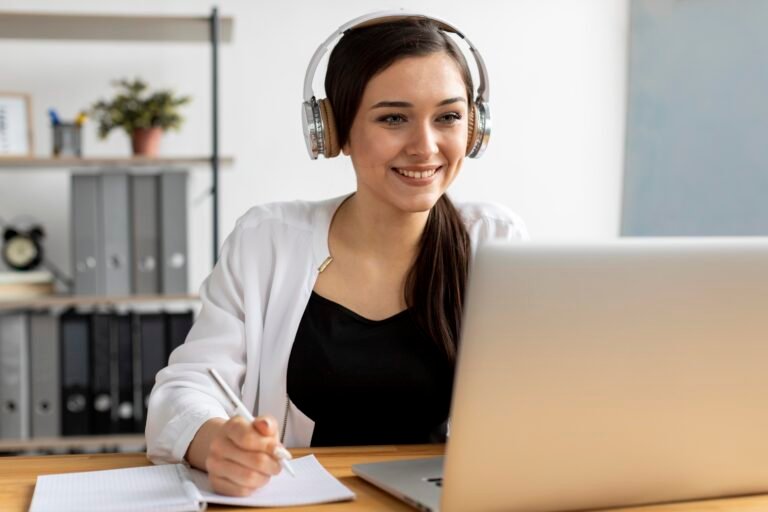 Professional Brandefy virtual assistant wearing a headset and working on a laptop